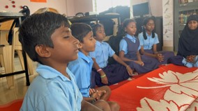 Children meditation mindfulness classroom